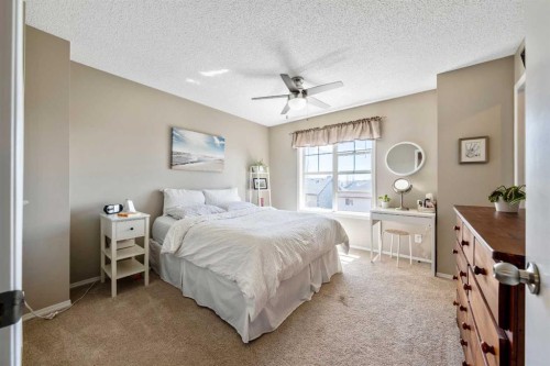 43 Toscana Gardens Nw, Calgary, AB - Indoor Photo Showing Bedroom