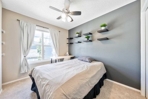 43 Toscana Gardens Nw, Calgary, AB - Indoor Photo Showing Bedroom