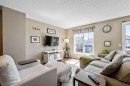 43 Toscana Gardens Nw, Calgary, AB  - Indoor Photo Showing Living Room 