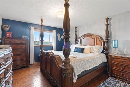 16 Bow Ridge Drive, Cochrane, AB - Indoor Photo Showing Bedroom