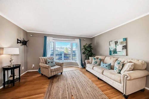 85 Rideau Close Sw, Airdrie, AB - Indoor Photo Showing Living Room
