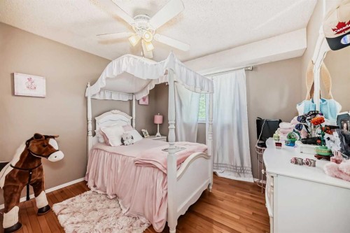 85 Rideau Close Sw, Airdrie, AB - Indoor Photo Showing Bedroom