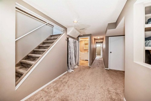 85 Rideau Close Sw, Airdrie, AB - Indoor Photo Showing Other Room