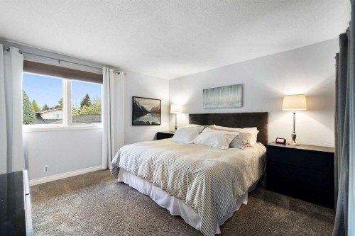 111 Lake Mead Place Se, Calgary, AB - Indoor Photo Showing Bedroom