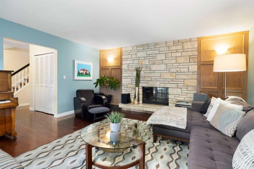 111 Lake Mead Place Se, Calgary, AB - Indoor Photo Showing Living Room With Fireplace