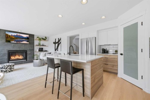 91 Bridleridge Crescent Sw, Calgary, AB - Indoor With Fireplace