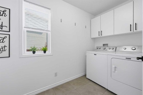 91 Bridleridge Crescent Sw, Calgary, AB - Indoor Photo Showing Laundry Room