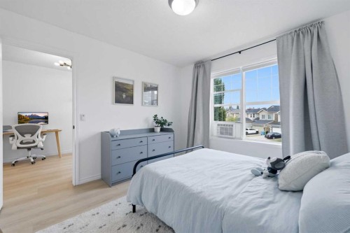 91 Bridleridge Crescent Sw, Calgary, AB - Indoor Photo Showing Bedroom