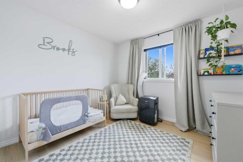 91 Bridleridge Crescent Sw, Calgary, AB - Indoor Photo Showing Other Room