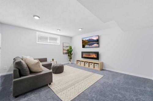 91 Bridleridge Crescent Sw, Calgary, AB - Indoor With Fireplace