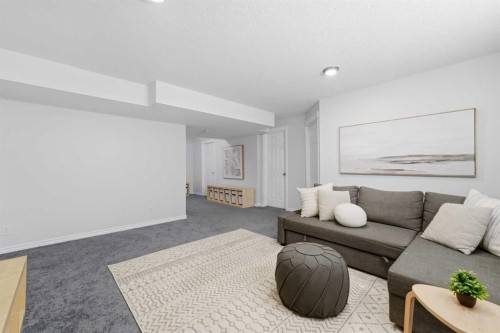 91 Bridleridge Crescent Sw, Calgary, AB - Indoor Photo Showing Living Room