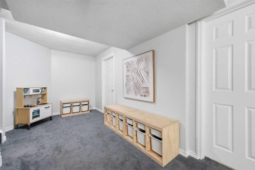 91 Bridleridge Crescent Sw, Calgary, AB - Indoor Photo Showing Other Room