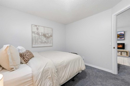 91 Bridleridge Crescent Sw, Calgary, AB - Indoor Photo Showing Bedroom
