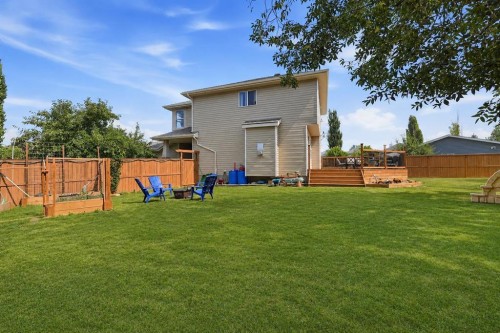 91 Bridleridge Crescent Sw, Calgary, AB - Outdoor With Backyard
