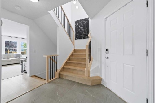 91 Bridleridge Crescent Sw, Calgary, AB - Indoor Photo Showing Other Room