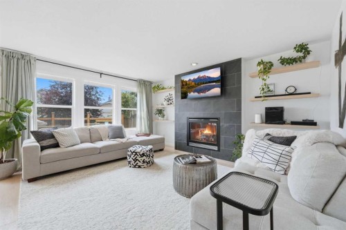 91 Bridleridge Crescent Sw, Calgary, AB - Indoor Photo Showing Living Room With Fireplace