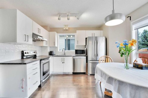 67 Somervale Drive Sw, Calgary, AB - Indoor Photo Showing Kitchen With Upgraded Kitchen