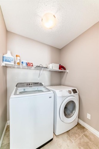 10 Reunion Grove Nw, Airdrie, AB - Indoor Photo Showing Laundry Room