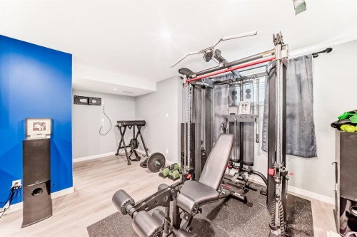 10 Reunion Grove Nw, Airdrie, AB - Indoor Photo Showing Gym Room