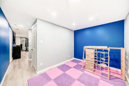 10 Reunion Grove Nw, Airdrie, AB - Indoor Photo Showing Other Room
