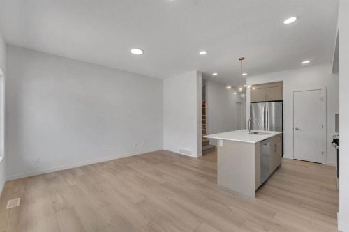 7 Heritage Heath, Cochrane, AB - Indoor Photo Showing Kitchen