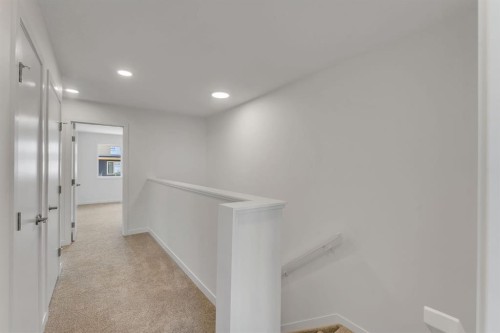 7 Heritage Heath, Cochrane, AB - Indoor Photo Showing Other Room