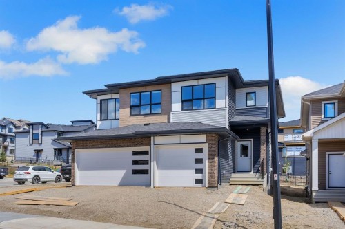 7 Heritage Heath, Cochrane, AB - Outdoor With Facade