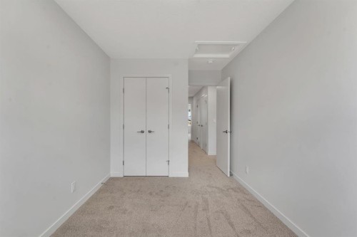 7 Heritage Heath, Cochrane, AB - Indoor Photo Showing Other Room