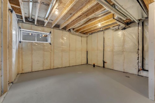 7 Heritage Heath, Cochrane, AB - Indoor Photo Showing Basement