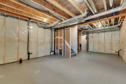 7 Heritage Heath, Cochrane, AB - Indoor Photo Showing Basement