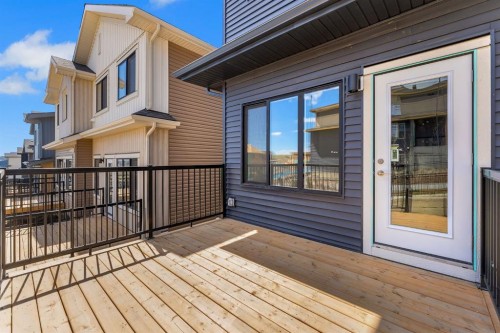 7 Heritage Heath, Cochrane, AB - Outdoor With Deck Patio Veranda With Exterior