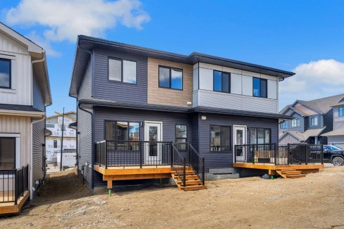 7 Heritage Heath, Cochrane, AB - Outdoor With Deck Patio Veranda