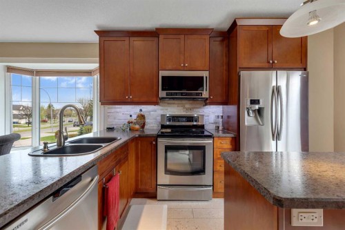 16371 Somercrest Street Sw, Calgary, AB - Indoor Photo Showing Kitchen With Double Sink