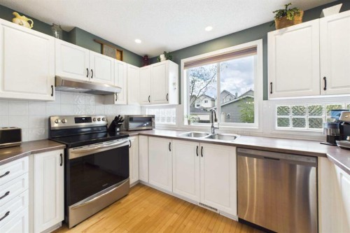 67 Prestwick Crescent Se, Calgary, AB - Indoor Photo Showing Kitchen With Double Sink