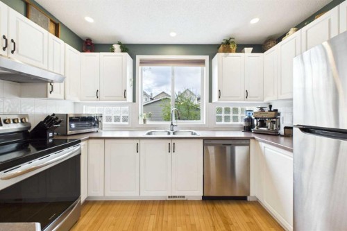 67 Prestwick Crescent Se, Calgary, AB - Indoor Photo Showing Kitchen With Double Sink