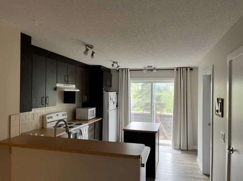 303-2445 Kingsland Road SE Airdrie, AB T4A 0B4