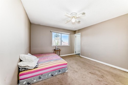 28 Rundlelawn Place Ne, Calgary, AB - Indoor Photo Showing Bedroom