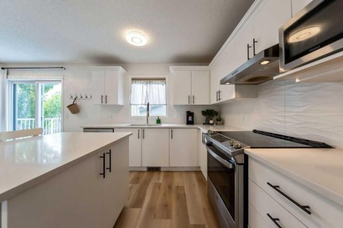 19 Drake Landing Way, Okotoks, AB 