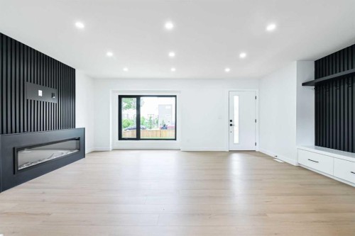4940 45 Street Sw, Calgary, AB - Indoor Photo Showing Living Room With Fireplace