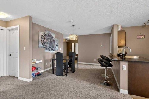 225-7210 80 Avenue Ne, Calgary, AB - Indoor Photo Showing Other Room