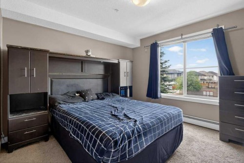 225-7210 80 Avenue Ne, Calgary, AB - Indoor Photo Showing Bedroom