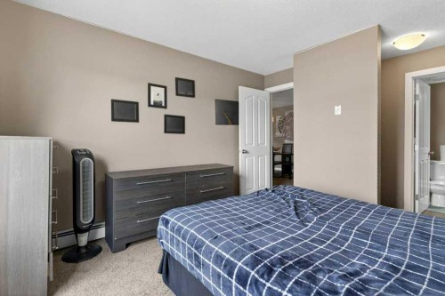 225-7210 80 Avenue Ne, Calgary, AB - Indoor Photo Showing Bedroom