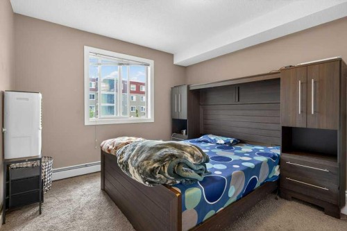 225-7210 80 Avenue Ne, Calgary, AB - Indoor Photo Showing Bedroom