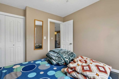 225-7210 80 Avenue Ne, Calgary, AB - Indoor Photo Showing Bedroom