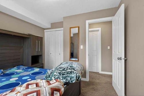 225-7210 80 Avenue Ne, Calgary, AB - Indoor Photo Showing Bedroom