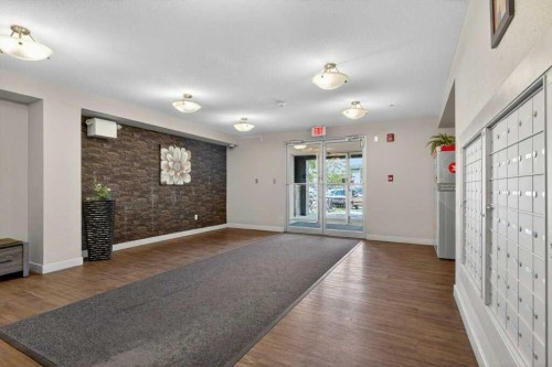 225-7210 80 Avenue Ne, Calgary, AB - Indoor Photo Showing Other Room