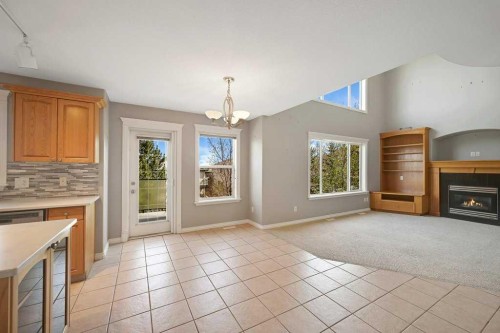 8 Valley Creek Crescent Nw, Calgary, AB - Indoor With Fireplace