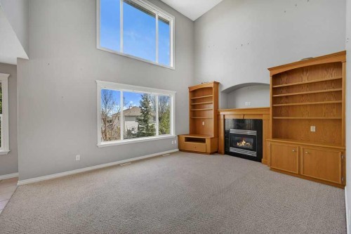 8 Valley Creek Crescent Nw, Calgary, AB - Indoor With Fireplace