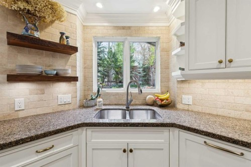 3013 Montcalm Crescent Sw, Calgary, AB - Indoor Photo Showing Kitchen With Double Sink