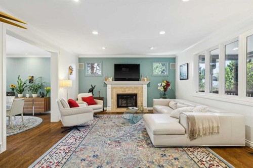 3013 Montcalm Crescent Sw, Calgary, AB - Indoor Photo Showing Living Room With Fireplace